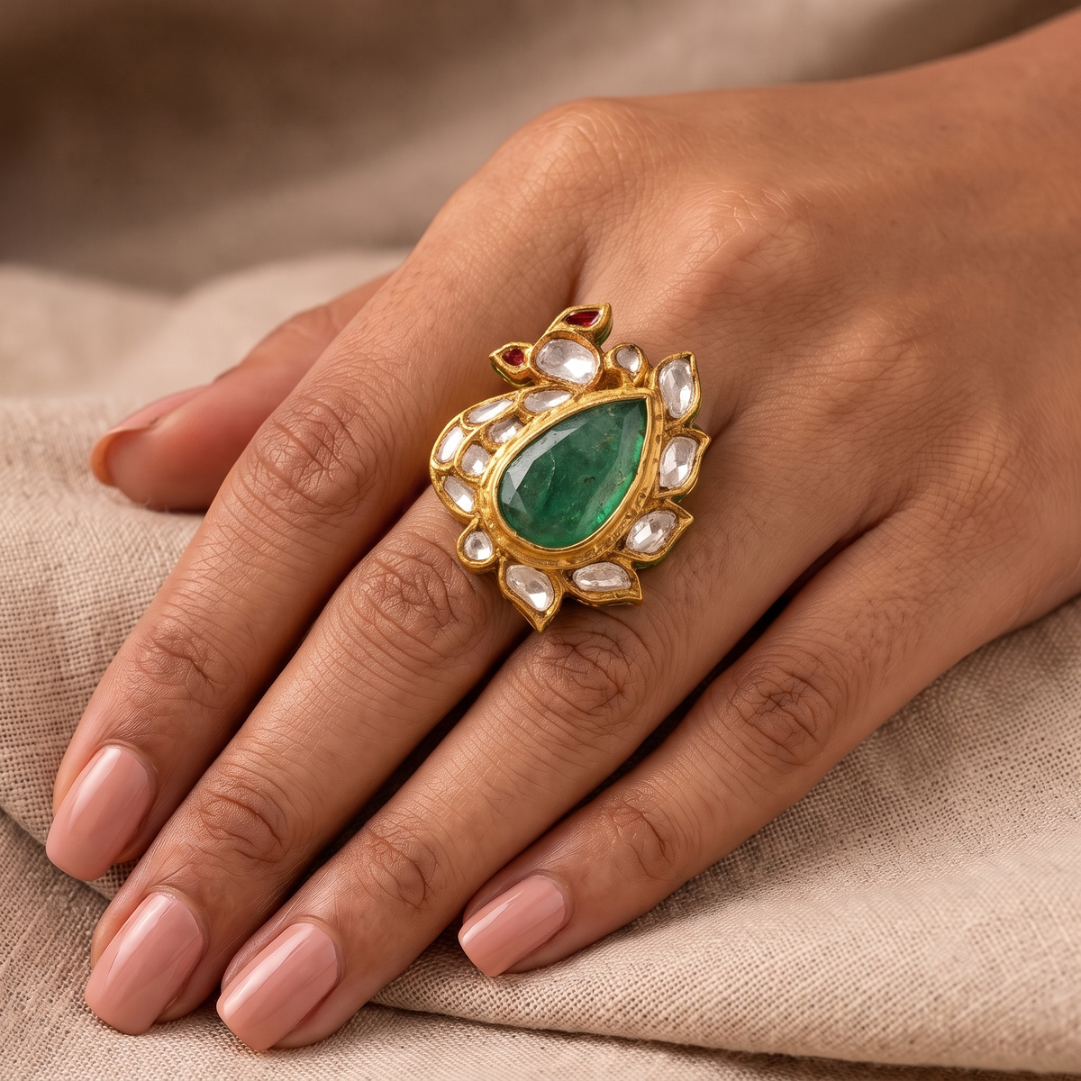 Emerald & Polki Peacock Ring in 22kt Gold.