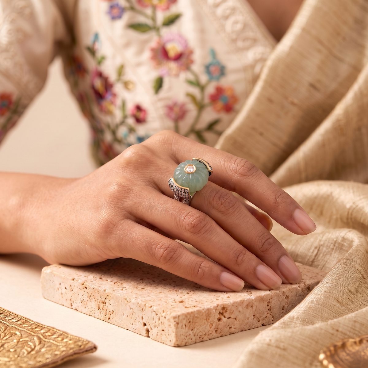 SILVER WITH DIAMONDS AND CARVED EMERALD